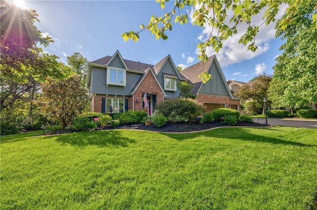 8618 W 138th Ter, Overland Park, KS 66223 - view of front of property featuring brick siding and a front lawn