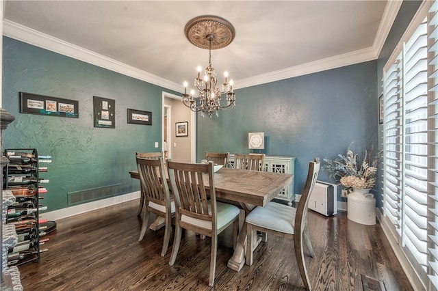 8618 W 138th Ter, Overland Park, KS 66223 - dining area with a chandelier, wood finished floors, crown molding, a textured wall, and baseboards