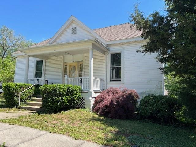 bungalow-style home featuring covered porch