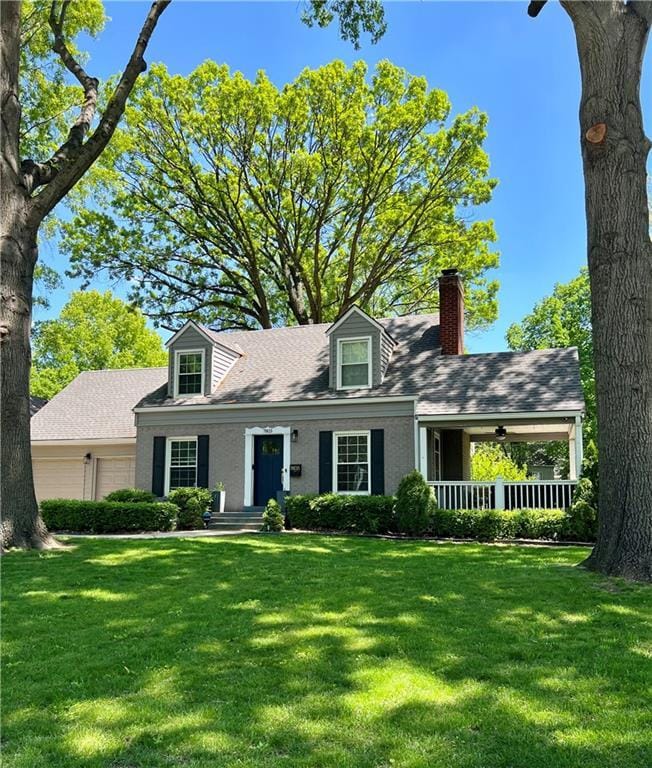 7803 Cambridge St, Prairie Village, KS 66208 - cape cod home featuring a chimney, a front lawn, a shingled roof, and an attached garage