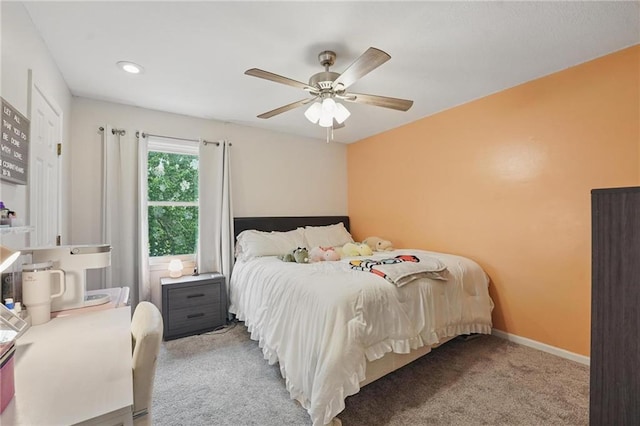 carpeted bedroom featuring ceiling fan, baseboards, and recessed lighting