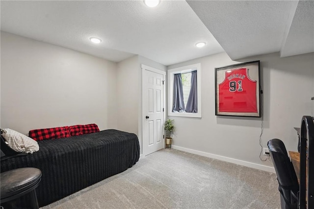 carpeted bedroom with baseboards, a textured ceiling, and recessed lighting