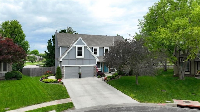 tudor-style house with concrete driveway, a garage, a shingled roof, and stone siding