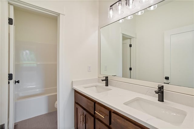 1604 Mulberry St, Pleasant Hill, MO 64080 - bathroom featuring double vanity and toilet