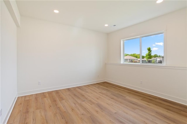 1604 Mulberry St, Pleasant Hill, MO 64080 - spare room featuring light wood finished floors, recessed lighting, and baseboards