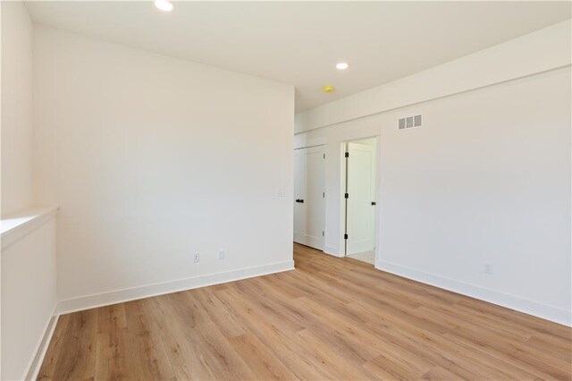 1604 Mulberry St, Pleasant Hill, MO 64080 - empty room featuring light wood-type flooring, recessed lighting, and baseboards