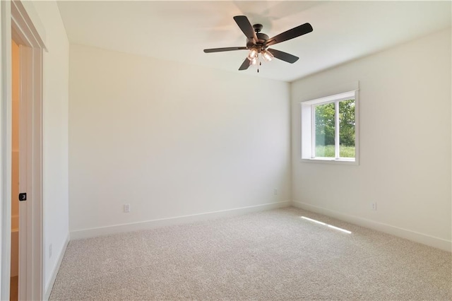 1604 Mulberry St, Pleasant Hill, MO 64080 - empty room with carpet, baseboards, and ceiling fan