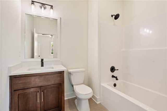 1604 Mulberry St, Pleasant Hill, MO 64080 - full bath featuring toilet, vanity, shower / washtub combination, baseboards, and tile patterned flooring