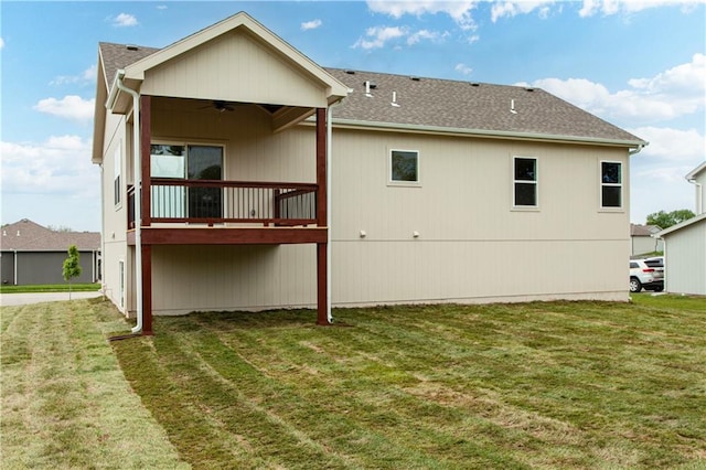 1604 Mulberry St, Pleasant Hill, MO 64080 - rear view of property featuring ceiling fan, a lawn, a wooden deck, and roof with shingles