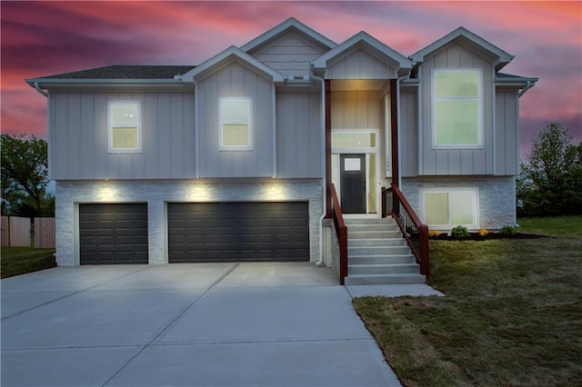 1604 Mulberry St, Pleasant Hill, MO 64080 - split foyer home with driveway, a garage, and board and batten siding