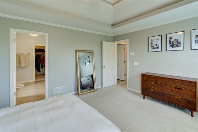 8812 NE 101st St, Kansas City, MO 64157 - carpeted bedroom featuring a walk in closet, ornamental molding, and baseboards