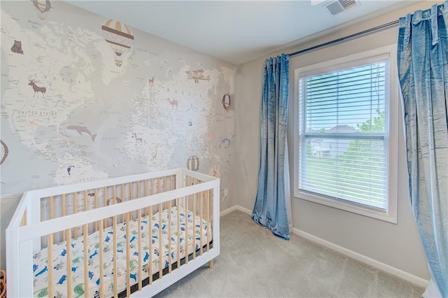 8812 NE 101st St, Kansas City, MO 64157 - bedroom featuring multiple windows, carpet floors, baseboards, and a crib