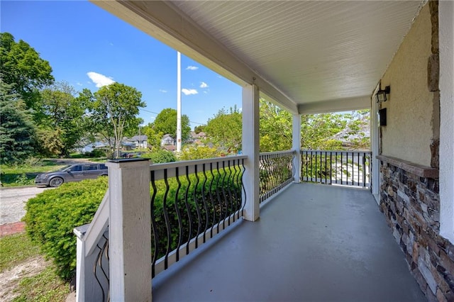 217 N Valley St, Kansas City, KS 66102 - balcony featuring covered porch