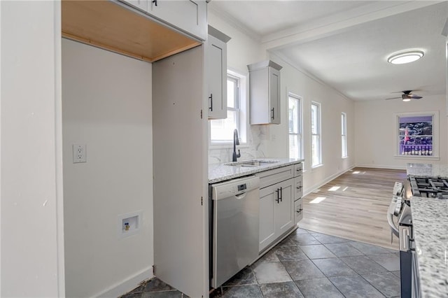 217 N Valley St, Kansas City, KS 66102 - kitchen featuring a sink, stainless steel appliances, crown molding, ceiling fan, and open floor plan