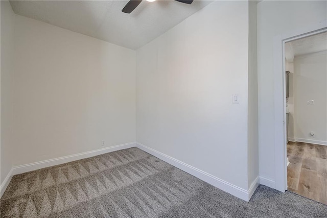 217 N Valley St, Kansas City, KS 66102 - empty room with carpet floors, a ceiling fan, and baseboards
