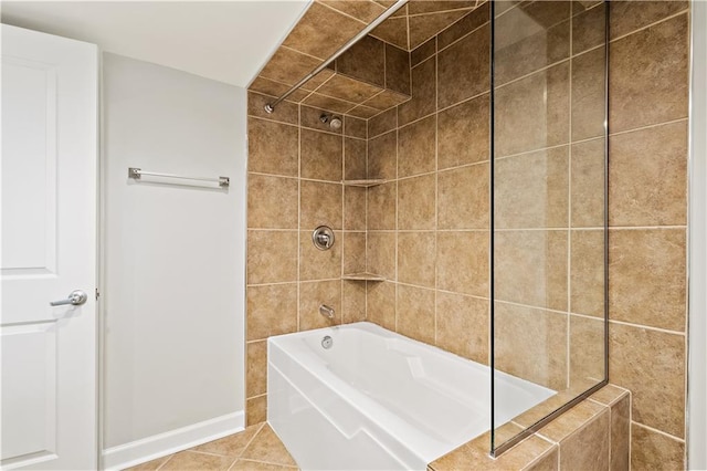 bathroom featuring tub / shower combination, tile patterned flooring, and baseboards