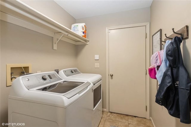 laundry room featuring independent washer and dryer