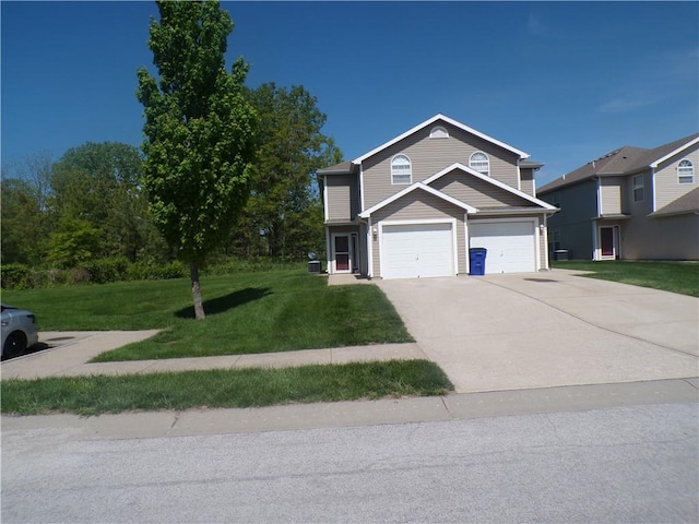 traditional-style home featuring concrete driveway and a front lawn