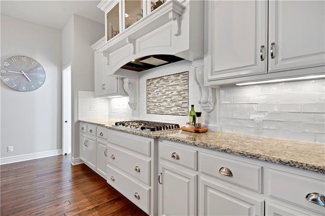 24411 W 70th St, Shawnee, KS 66226 - kitchen with white cabinetry, backsplash, baseboards, and light stone countertops