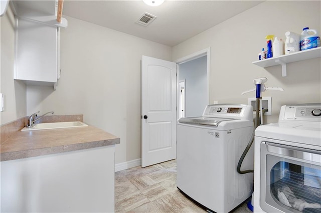 24411 W 70th St, Shawnee, KS 66226 - washroom featuring washer and dryer and baseboards
