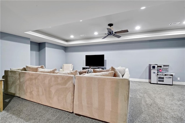 24411 W 70th St, Shawnee, KS 66226 - living area featuring carpet flooring, baseboards, a tray ceiling, recessed lighting, and ceiling fan