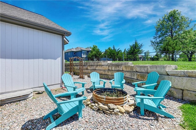 24411 W 70th St, Shawnee, KS 66226 - view of patio with a fire pit and fence