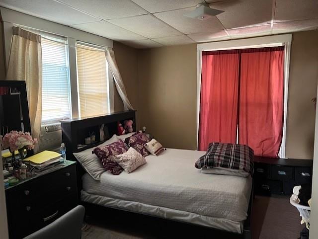 bedroom featuring a paneled ceiling