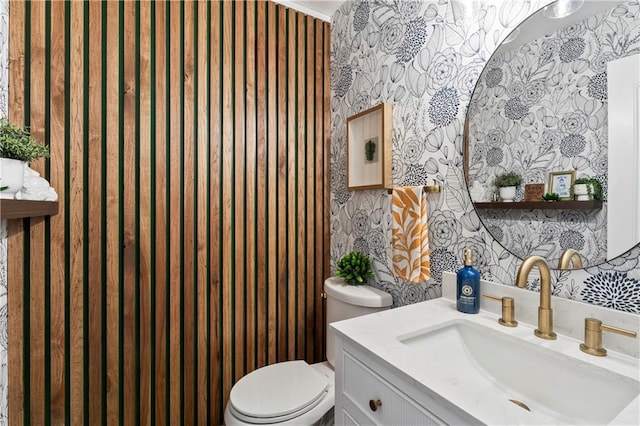 9808 N Hedges Ave, Kansas City, MO 64157 - half bath featuring wallpapered walls, toilet, and vanity