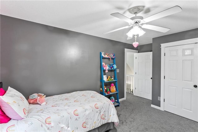 9808 N Hedges Ave, Kansas City, MO 64157 - bedroom with carpet, baseboards, and ceiling fan