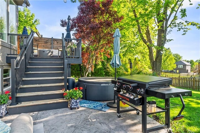 9808 N Hedges Ave, Kansas City, MO 64157 - view of patio featuring a hot tub, stairs, and fence