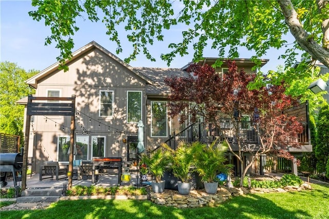 9808 N Hedges Ave, Kansas City, MO 64157 - back of property with a patio area and a lawn