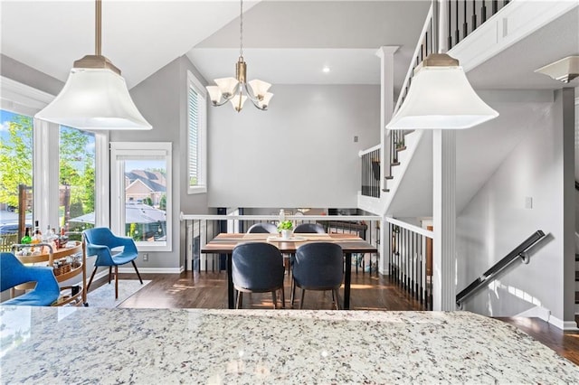 9808 N Hedges Ave, Kansas City, MO 64157 - dining area featuring wood finished floors, baseboards, a chandelier, and recessed lighting