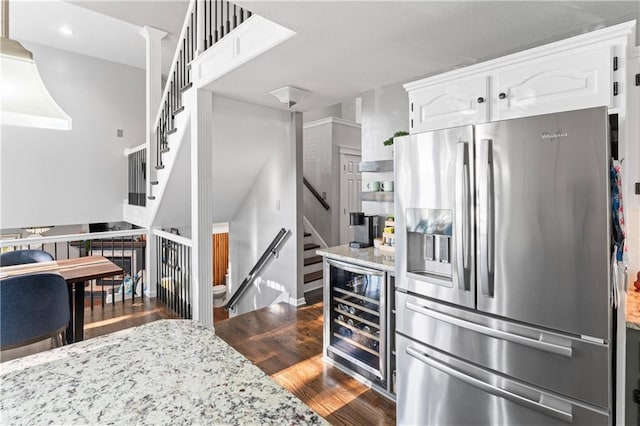 9808 N Hedges Ave, Kansas City, MO 64157 - kitchen featuring stainless steel fridge, beverage cooler, dark wood finished floors, white cabinets, and recessed lighting