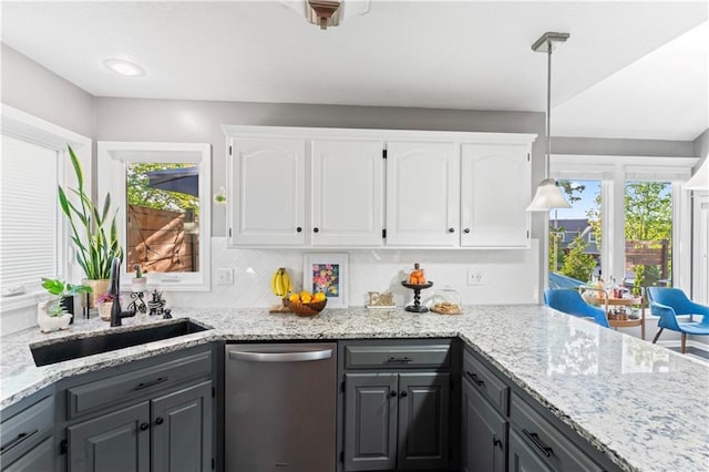9808 N Hedges Ave, Kansas City, MO 64157 - kitchen featuring dishwasher, gray cabinets, white cabinetry, and light stone counters