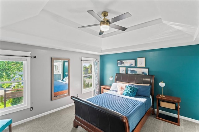 9808 N Hedges Ave, Kansas City, MO 64157 - bedroom with carpet flooring, baseboards, and a raised ceiling