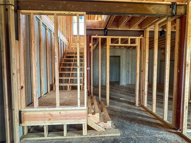 10026 Aurora St, Lenexa, KS 66220 - misc room with stairway