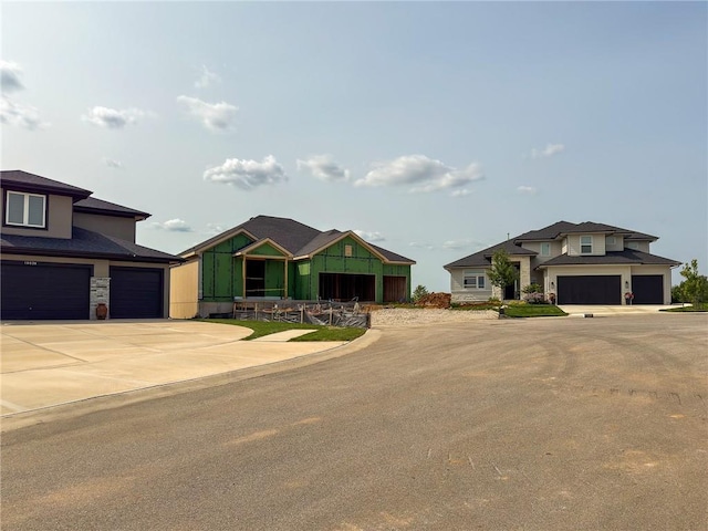 10026 Aurora St, Lenexa, KS 66220 - view of front of home featuring stone siding and driveway