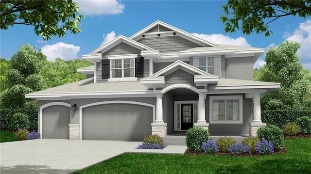 view of front of house with concrete driveway, a front yard, stucco siding, and an attached garage