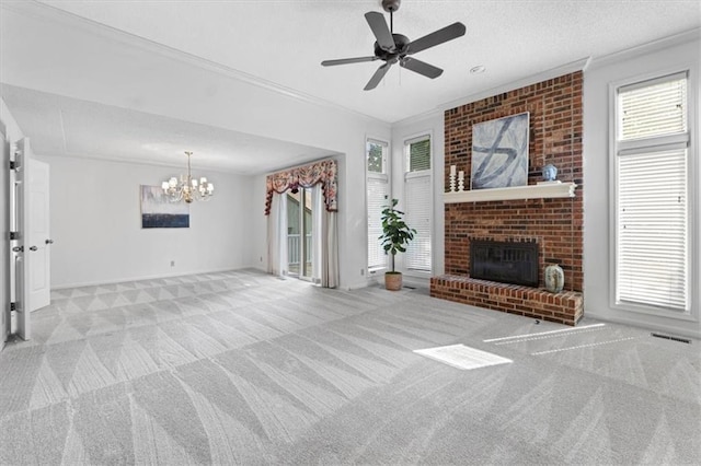7955 W 118th Pl, Overland Park, KS 66210 - unfurnished living room with carpet, plenty of natural light, crown molding, a fireplace, and a textured ceiling