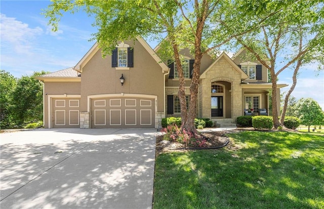 8701 W 157th St, Overland Park, KS 66221 - traditional home featuring stone siding, concrete driveway, stucco siding, and a front lawn