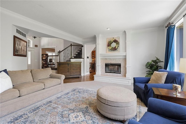 8701 W 157th St, Overland Park, KS 66221 - living room featuring stairway, crown molding, a high end fireplace, and wood finished floors