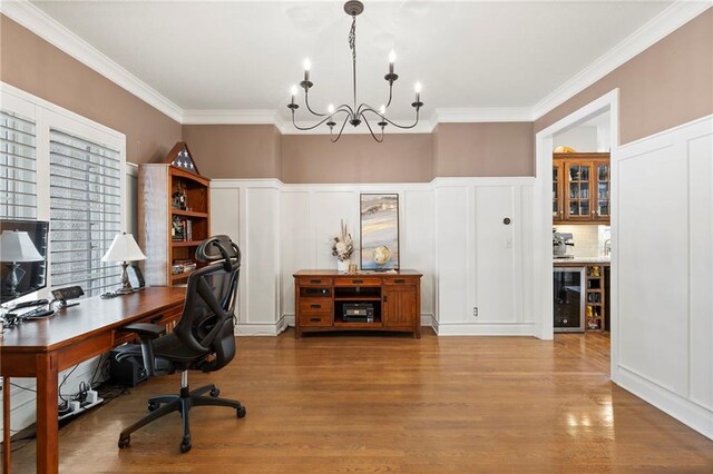 8701 W 157th St, Overland Park, KS 66221 - office space with a decorative wall, crown molding, a chandelier, wood finished floors, and wine cooler