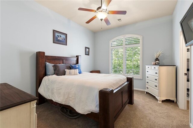 8701 W 157th St, Overland Park, KS 66221 - bedroom with light carpet and a ceiling fan