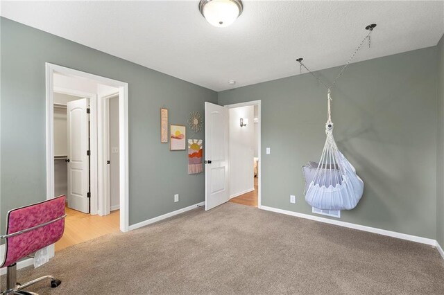 8701 W 157th St, Overland Park, KS 66221 - carpeted bedroom featuring baseboards and a spacious closet