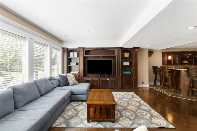 8701 W 157th St, Overland Park, KS 66221 - living room featuring bar, baseboards, and recessed lighting