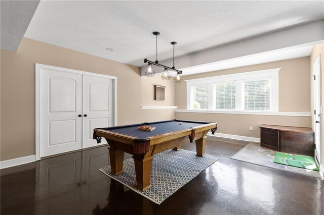 8701 W 157th St, Overland Park, KS 66221 - recreation room featuring finished concrete floors, baseboards, billiards table, and a textured ceiling