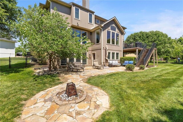 8701 W 157th St, Overland Park, KS 66221 - back of house with an outdoor fire pit, a patio, a chimney, stairway, and a wooden deck