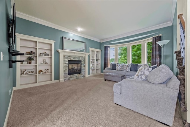 14692 S Garnett St, Olathe, KS 66062 - living area featuring ornamental molding, carpet floors, and a stone fireplace