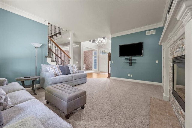 14692 S Garnett St, Olathe, KS 66062 - living room with stairs, a fireplace with flush hearth, a chandelier, ornamental molding, and carpet flooring