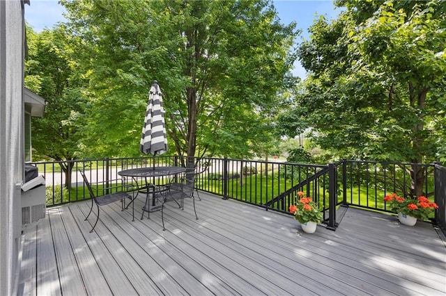 14692 S Garnett St, Olathe, KS 66062 - wooden terrace with outdoor dining area